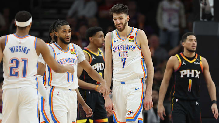Oklahoma City Thunder big man Chet Holmgren smiles during a game against the Phoenix Suns.