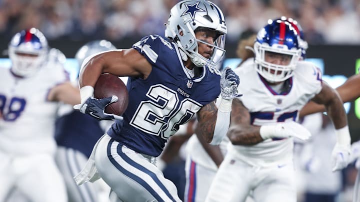 Sep 26, 2022; East Rutherford, New Jersey, USA;  Dallas Cowboys running back Tony Pollard (20) runs