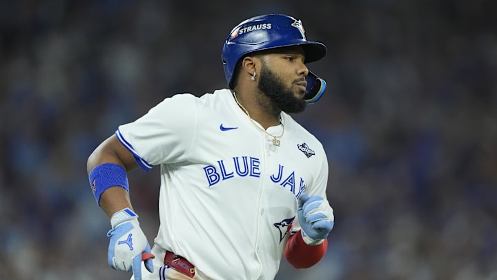 Toronto Blue Jays first baseman Vladimir Guerrero Jr. (27) walks to first base in the third inning against the Los Angeles Dodgers during game seven of the 2025 MLB World Series at Rogers Centre. 