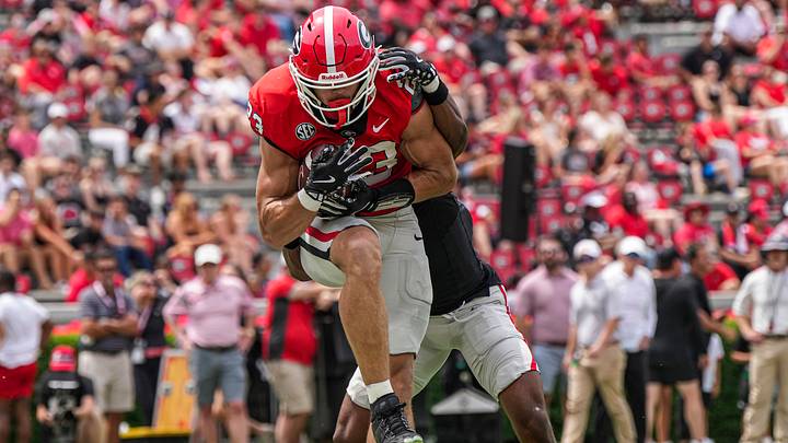Apr 18, 2026; Athens, GA, USA; Georgia Bulldogs tight end Jaden Reddell (23) catches a touchdown pass behind safety Khaill Barnes (7) during the Georgia Spring football game at Sanford Stadium. Mandatory Credit: Dale Zanine-Imagn Images