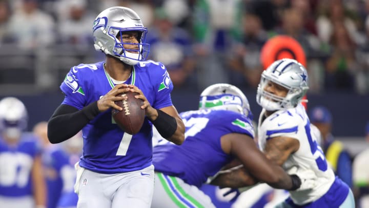 Nov 30, 2023; Arlington, Texas, USA; Seattle Seahawks quarterback Geno Smith (7) looks to pass against the Dallas Cowboys during the second half at AT&T Stadium. Mandatory Credit: Tim Heitman-USA TODAY Sports