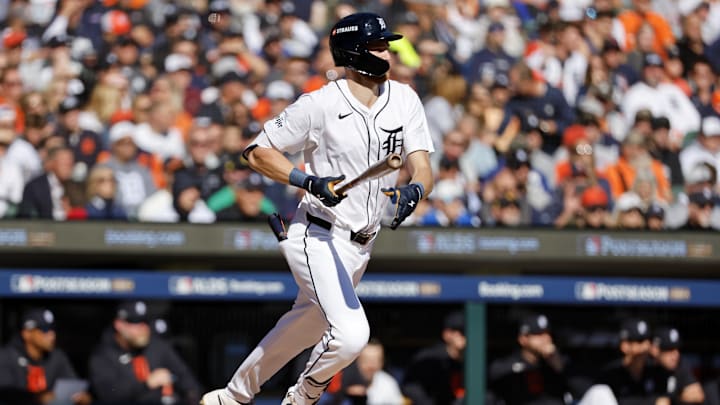Oct 9, 2024; Detroit, Michigan, USA; Detroit Tigers outfielder Parker Meadows (22) hits a single against the Cleveland Guardians during the first inning during game three of the ALDS for the 2024 MLB Playoffs at Comerica Park.