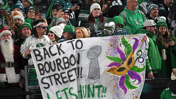 1Jan 26, 2025; Philadelphia, PA, USA; Philadelphia Eagles fans with hold a sign after defeating the Washington Commanders in the NFC Championship game at Lincoln Financial Field. Mandatory Credit: Eric Hartline-Imagn Images