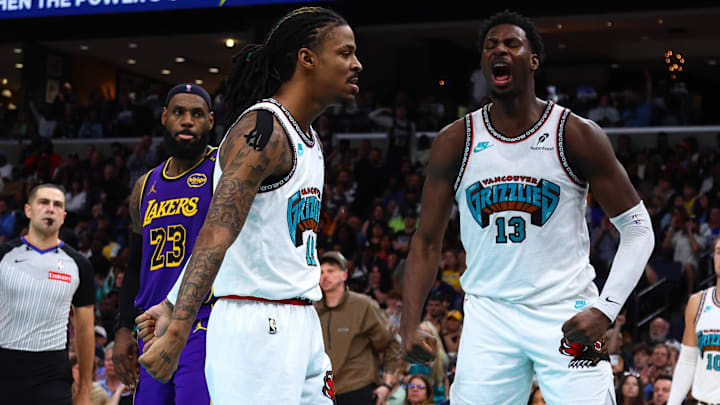 Mar 29, 2025; Memphis, Tennessee, USA; Memphis Grizzlies guard Ja Morant (12) and Memphis Grizzlies forward Jaren Jackson Jr. (13) react during the third quarter against the Los Angeles Lakers at FedExForum. Mandatory Credit: Petre Thomas-Imagn Images Mar 29, 2025; Memphis, Tennessee, USA; Memphis Grizzlies guard Ja Morant (12) and Memphis Grizzlies forward Jaren Jackson Jr. (13) react during the third quarter against the Los Angeles Lakers at FedExForum. Mandatory Credit: Petre Thomas-Imagn Images