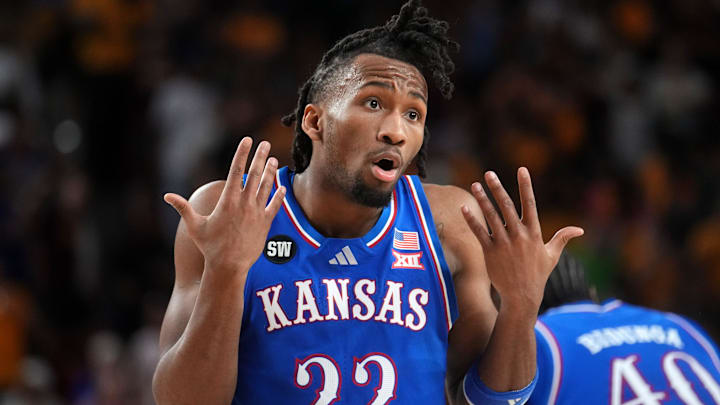 Kansas Jayhawks guard Darryn Peterson (22) looks to the referee after getting a foul called against him as they play the ASU Sun Devils at Desert Financial Arena in Tempe on March 3, 2026.