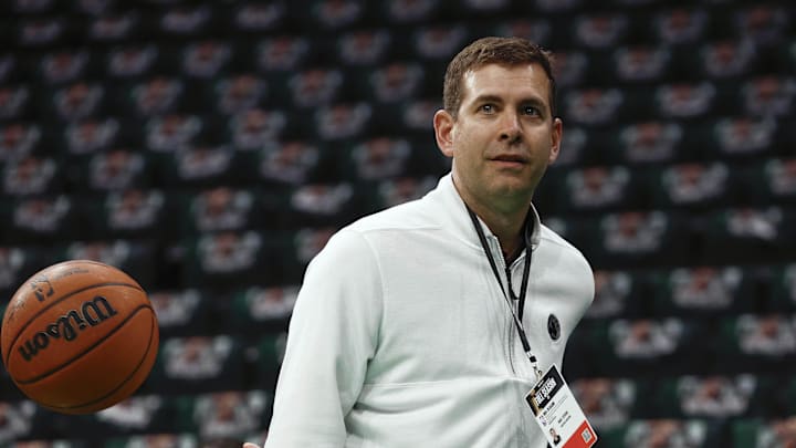 Feb 28, 2025; Boston, Massachusetts, USA; Boston Celtics president of basketball operations Brad Stevens throws a behind the back pass to one of his players before their game against the Cleveland Cavaliers at TD Garden. Mandatory Credit: Winslow Townson-Imagn Images