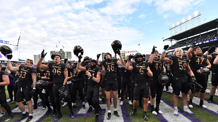 The Northwestern Wildcats celebrate after their victory