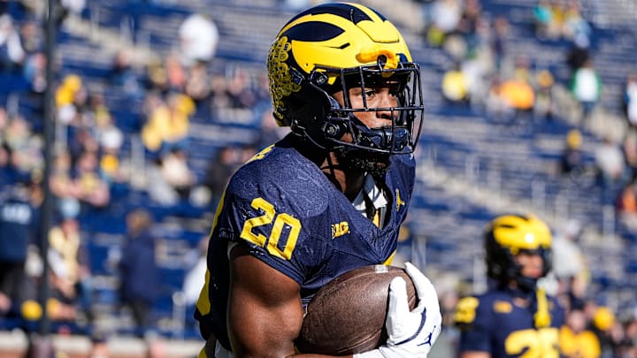 Michigan running back Kalel Mullings (20) warms up before the Oregon game at Michigan Stadium in Ann Arbor on Saturday, Nov. 2, 2024.