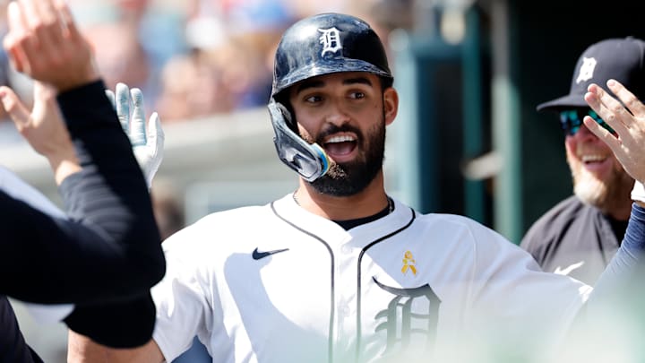 Detroit Tigers outfielder Riley Greene (31) receives congratulations from teammates after scoring in the first inning against the Chicago White Sox at Comerica Park. 