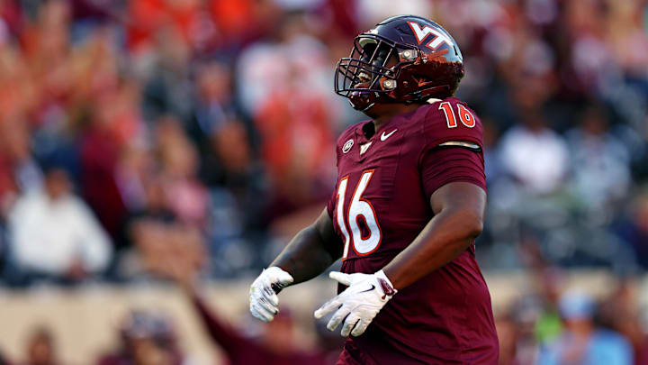 Sep 7, 2024; Blacksburg, Virginia, USA; Virginia Tech Hokies defensive lineman Aeneas Peebles (16) celebrates after a sack during the second quarter against the Marshall Thundering Herd at Lane Stadium. Mandatory Credit: Peter Casey-Imagn Images