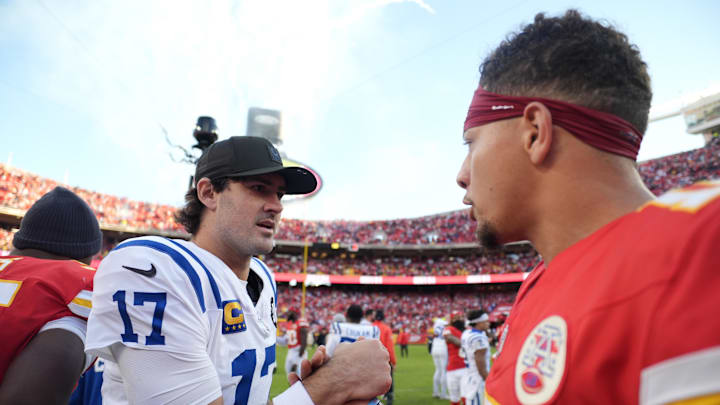 Nov 23, 2025; Kansas City, Missouri, USA;  Indianapolis Colts quarterback Daniel Jones (17) and Kansas City Chiefs quarterback Patrick Mahomes (15) meet on field after the game at GEHA Field at Arrowhead Stadium. Mandatory Credit: Jay Biggerstaff-Imagn Images