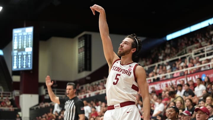Feb 28, 2026; Stanford, California, USA; Stanford Cardinal guard Benny Gealer (5) follows through after shooting a three-point shot against the Southern Methodist University Mustangs during the first half at Maples Pavilion. Mandatory Credit: Darren Yamashita-Imagn Images