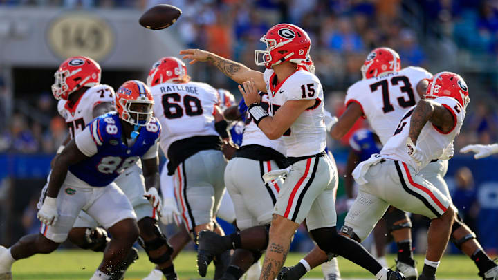 Georgia Bulldogs quarterback Carson Beck (15) throws the ball during the second quarter of an NCAA football game Saturday, Oct. 28, 2023 at EverBank Stadium in Jacksonville, Fla. Georgia defeated Florida 43-20. [Corey Perrine/Florida Times-Union]