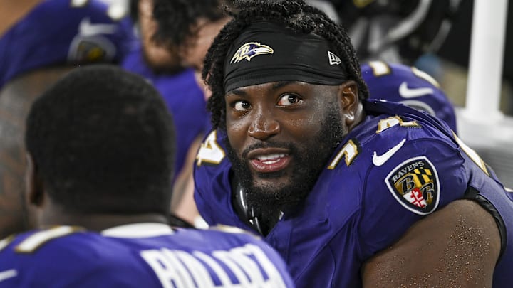 Aug 9, 2024; Baltimore, Maryland, USA; Baltimore Ravens offensive tackle Josh Jones (74) sits on the bench during the second half  of a preseason game against the Philadelphia Eagles  at M&T Bank Stadium. Mandatory Credit: Tommy Gilligan-Imagn Images