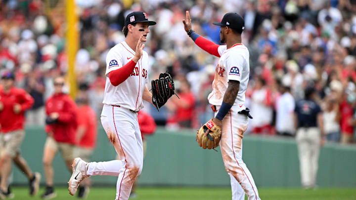 Jul 27, 2025; Boston, Massachusetts, USA; Boston Red Sox right fielder Roman Anthony (19) high-fives center fielder Ceddanne Rafaela (3) after a game against the Los Angeles Dodgers at Fenway Park. Mandatory Credit: Brian Fluharty-Imagn Images