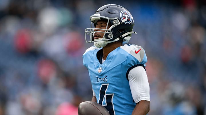 Oct 19, 2025; Nashville, Tennessee, USA;  Tennessee Titans wide receiver Tyler Lockett (4) against the New England Patriots during pre-game warmups at Nissan Stadium.