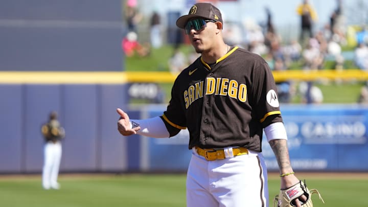 Feb 24, 2023; Peoria, Arizona, USA; San Diego Padres third baseman Manny Machado (13) talks to an