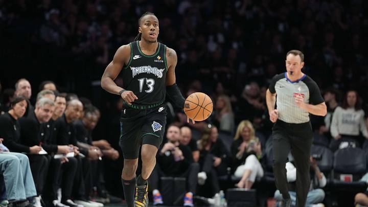 May 15, 2026; Minneapolis, Minnesota, USA; Minnesota Timberwolves guard Ayo Dosunmu (13) dribbles the ball against the San Antonio Spurs in the second during game six of the second round of the 2026 NBA Playoffs at Target Center. Mandatory Credit: Jesse Johnson-Imagn Images