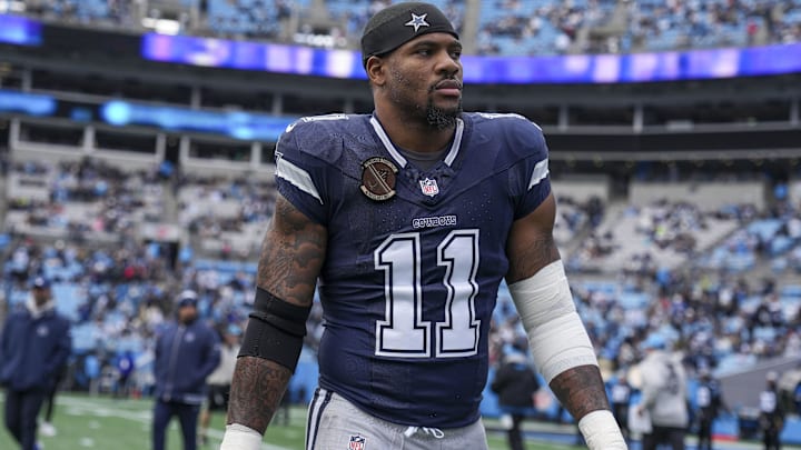 Dallas Cowboys linebacker Micah Parsons walks onto the field during the first quarter against the Carolina Panthers at Bank of America Stadium. Dallas Cowboys linebacker Micah Parsons walks onto the field during the first quarter against the Carolina Panthers at Bank of America Stadium.