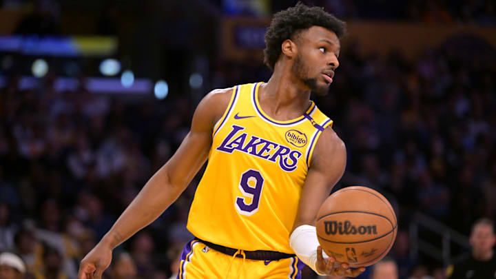 Mar 19, 2025; Los Angeles, California, USA; Los Angeles Lakers guard Bronny James (9) inbound the ball in the second half against the Denver Nuggets at Crypto.com Arena. Mandatory Credit: Jayne Kamin-Oncea-Imagn Images Mar 19, 2025; Los Angeles, California, USA; Los Angeles Lakers guard Bronny James (9) inbound the ball in the second half against the Denver Nuggets at Crypto.com Arena. Mandatory Credit: Jayne Kamin-Oncea-Imagn Images
