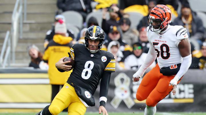 Nov 16, 2025; Pittsburgh, Pennsylvania, USA; Pittsburgh Steelers quarterback Aaron Rodgers (8) slides after a run against the Cincinnati Bengals during the first half at Acrisure Stadium. Mandatory Credit: Charles LeClaire-Imagn Images
