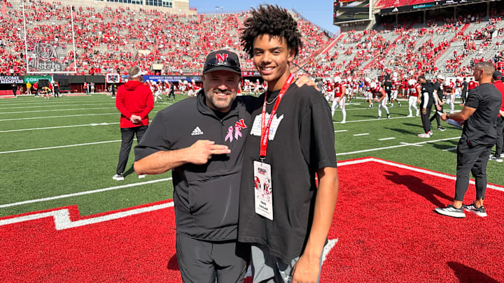 2027 four-star quarterback Trae Taylor (right) with Nebraska football coach Matt Rhule (left) after the Rutgers game.