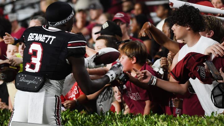 The University of South Carolina Spring football game took place at William-Brice Stadium on April 24, 2024. USC's Mazeo Bennett (3) from Greenville High greets fans on the sidelines.