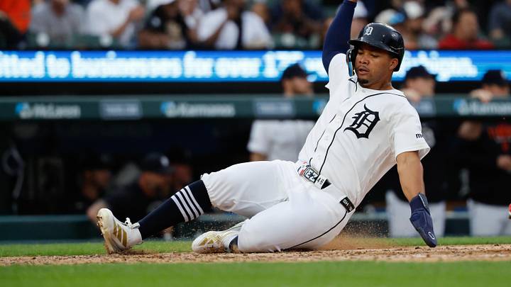 May 26, 2026; Detroit, Michigan, USA;  Detroit Tigers right fielder Wenceel Perez (46) slides in safe at home in the fifth inning against the Los Angeles Angels at Comerica Park. Mandatory Credit: Rick Osentoski-Imagn Images