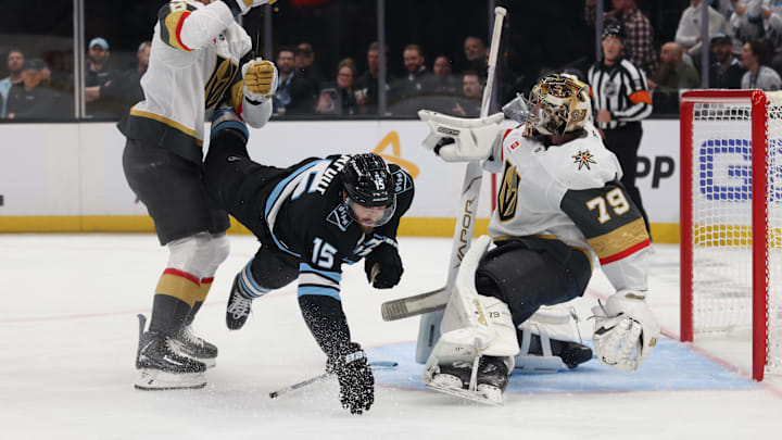Apr 24, 2026; Salt Lake City, Utah, USA; Utah Mammoth center Alexander Kerfoot (15) is called for a penalty after running into Vegas Golden Knights goaltender Carter Hart (79) during the first period in game three of the first round of the 2026 Stanley Cup Playoffs at Delta Center. Mandatory Credit: Rob Gray-Imagn Images