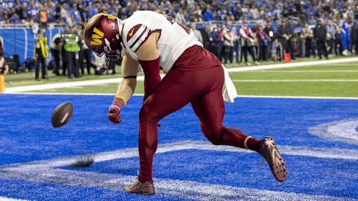 Jan 18, 2025; Detroit, Michigan, USA;  Washington Commanders tight end Zach Ertz (86) celebrates a touchdown during the second quarter against Detroit Lions at Ford Field. Mandatory Credit: David Reginek-Imagn Images