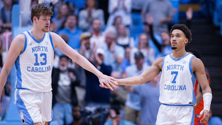 Mar 3, 2026; Chapel Hill, North Carolina, USA; North Carolina Tar Heels center Henri Veesaar (13) celebrates with guard Seth Trimble (7) during the second half against the Clemson Tigers at Dean E. Smith Center. Mandatory Credit: Scott Kinser-Imagn Images