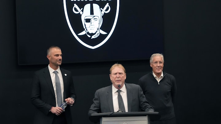 Jan 27, 2025; Las Vegas, NV, USA; Las Vegas Raiders owner Mark Davis (center) introduces general manager John Spytek (left) and coach Pete Carroll at press conference at Intermountain Health Performance Center. Mandatory Credit: Kirby Lee-Imagn Images Jan 27, 2025; Las Vegas, NV, USA; Las Vegas Raiders owner Mark Davis (center) introduces general manager John Spytek (left) and coach Pete Carroll at press conference at Intermountain Health Performance Center. Mandatory Credit: Kirby Lee-Imagn Images