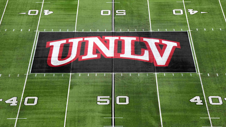 The UNLV Rebels logo at midfield during the Mountain West Championship at Allegiant Stadium. Mandatory Credit: Kirby Lee-Imagn Images The UNLV Rebels logo at midfield during the Mountain West Championship at Allegiant Stadium. Mandatory Credit: Kirby Lee-Imagn Images