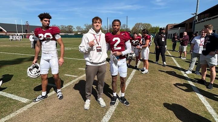 2026 QB prospect Anthony Coellner poses alongside Alabama wideouts Ryan Williams (2) and Derek Meadows (30)