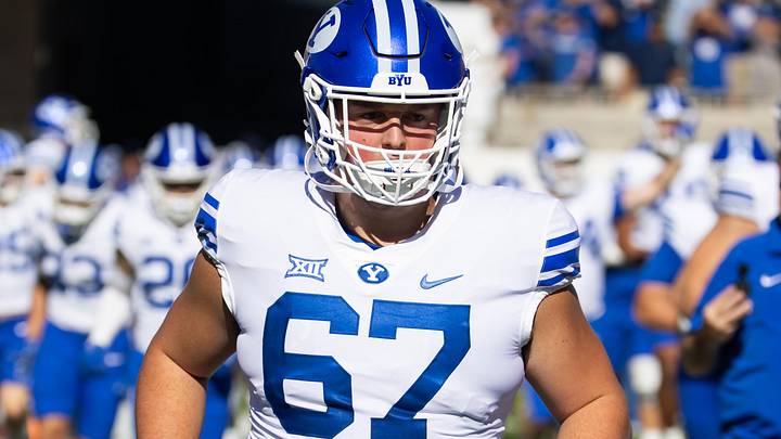 Nov 23, 2024; Tempe, Arizona, USA; Brigham Young Cougars offensive lineman Trevor Pay (67) against the Arizona State Sun Devils at Mountain America Stadium. Mandatory Credit: Mark J. Rebilas-Imagn Images