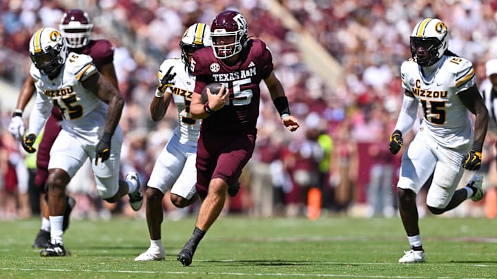 Oct 5, 2024; College Station, Texas, USA; Texas A&M Aggies quarterback Conner Weigman (15) runs the ball in the second quarter against the Missouri Tigers at Kyle Field. 
