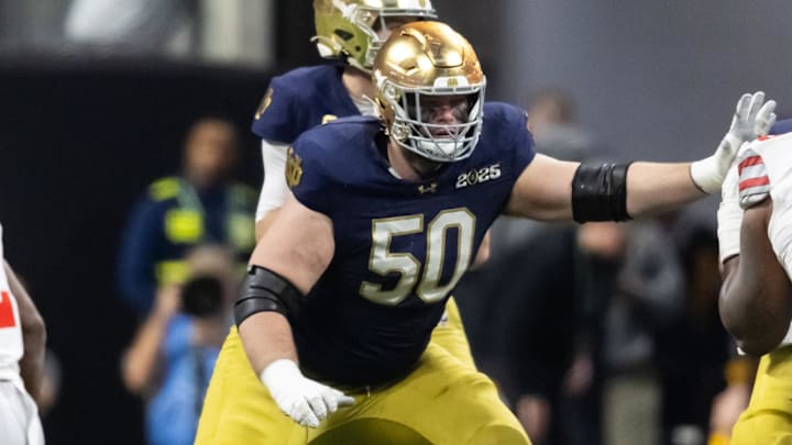 Jan 20, 2025; Atlanta, GA, USA; Notre Dame Fighting Irish offensive lineman Rocco Spindler (50) against the Ohio State Buckeyes during the CFP National Championship college football game at Mercedes-Benz Stadium. 