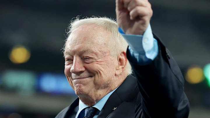 Dallas Cowboys owner Jerry Jones leaves the field before a game against the New York Giants.