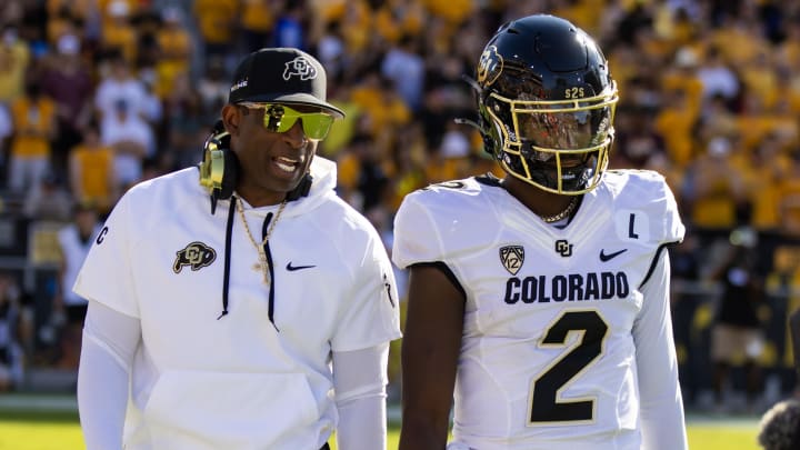 Oct 7, 2023; Tempe, Arizona, USA; Colorado Buffaloes head coach Deion Sanders with son and quarterback Shedeur Sanders (2) against the Arizona State Sun Devils at Mountain America Stadium. Mandatory Credit: Mark J. Rebilas-USA TODAY Sports Oct 7, 2023; Tempe, Arizona, USA; Colorado Buffaloes head coach Deion Sanders with son and quarterback Shedeur Sanders (2) against the Arizona State Sun Devils at Mountain America Stadium. Mandatory Credit: Mark J. Rebilas-USA TODAY Sports