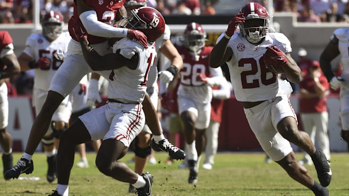 Apr 13, 2024; Tuscaloosa, AL, USA;  Alabama running back Jam Miller (26) runs the ball behind a