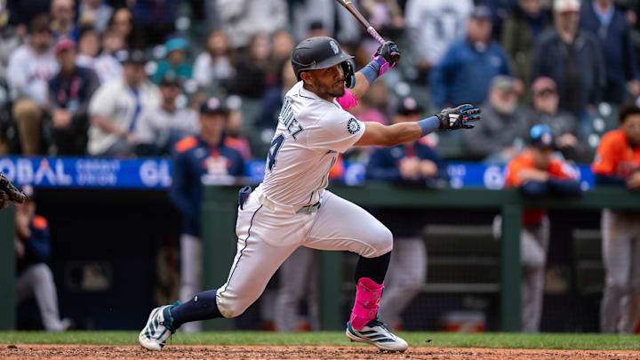 Seattle Mariners center fielder Julio Rodriguez hits a two-run double during a game against the Houston Astros on April 9 at T-Mobile Park.
