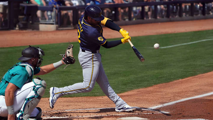 Mar 14, 2024; Peoria, Arizona, USA; Milwaukee Brewers catcher Eric Haase (13) bats against the