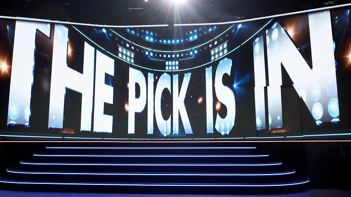 Jun 27, 2025; Los Angeles, California, USA; The video board shows the 20th overall pick for the Columbus Blue Jackets is about to be announced in the first round of the 2025 NHL Draft at Peacock Theater. 