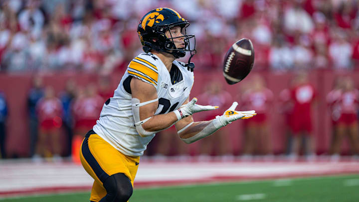 Oct 11, 2025; Madison, Wisconsin, USA; Iowa Hawkeyes wide receiver Kaden Wetjen (21) receives the opening kickoff against the Wisconsin Badgers at Camp Randall Stadium. Mandatory Credit: Ross Harried-Imagn Images