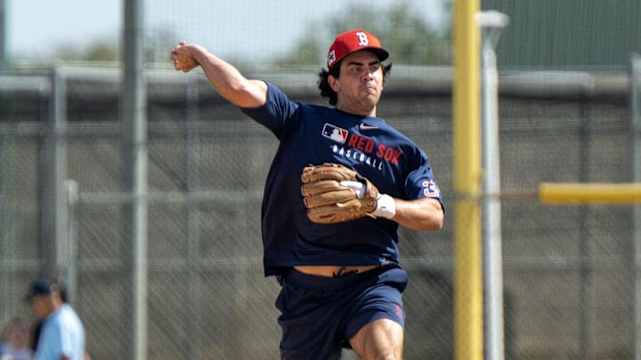 Feb 15, 2025; Lee County, FL, USA; Boston Red Sox shortstop Marcelo Mayer (38) throws the ball to second base during spring training at Jet Blue Park  at Fenway South Credit  Chris Tilley-Imagn Images