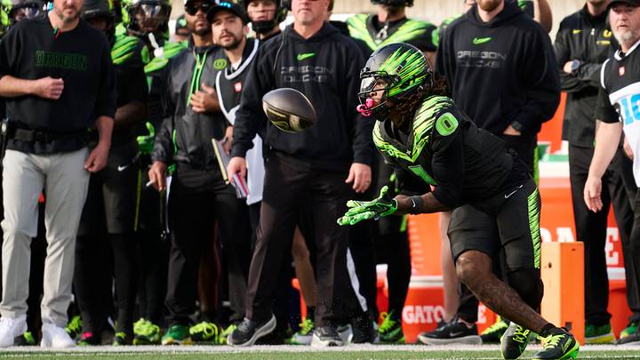 Oct 10, 2026; Eugene, Oregon, USA; Oregon Ducks wide receiver Dakorien Moore (1) catches a pass during the second half against the UCLA Bruins at Autzen Stadium. Mandatory Credit: Troy Wayrynen-Imagn Images