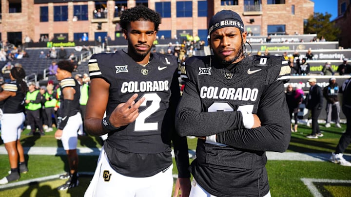 Colorado Buffaloes quarterback Shedeur Sanders and safety Shilo Sanders pose for a photo before the game against the Oklahoma State Cowboys.