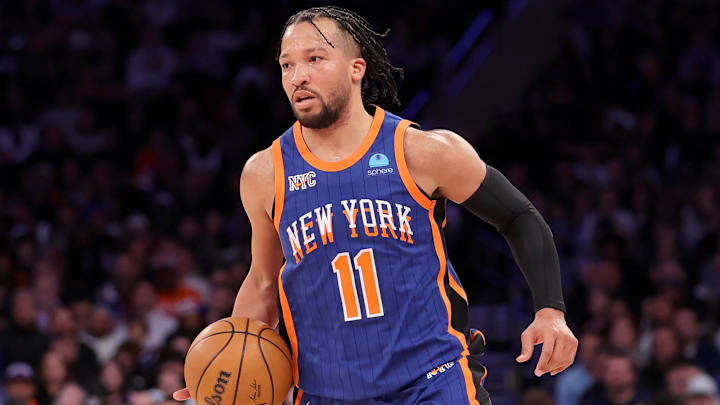 New York Knicks guard Jalen Brunson (11) brings the ball up.