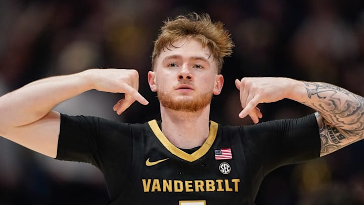 Vanderbilt forward Tyler Nickel (5) celebrates a three-pointer during the first half of the SEC tournament championship game against Arkansas at Bridgestone Arena in Nashville, Tenn., Sunday, March 15, 2026.