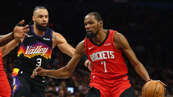 Apr 7, 2026; Phoenix, Arizona, USA; Houston Rockets forward Kevin Durant (7) against Phoenix Suns forward Dillon Brooks (3) in the first half at Mortgage Matchup Center. Mandatory Credit: Mark J. Rebilas-Imagn Images
